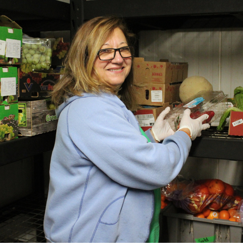 Anne sorting vegetables.