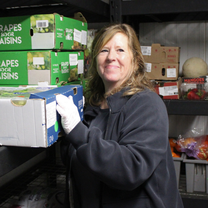 Laurie sorting vegetables.