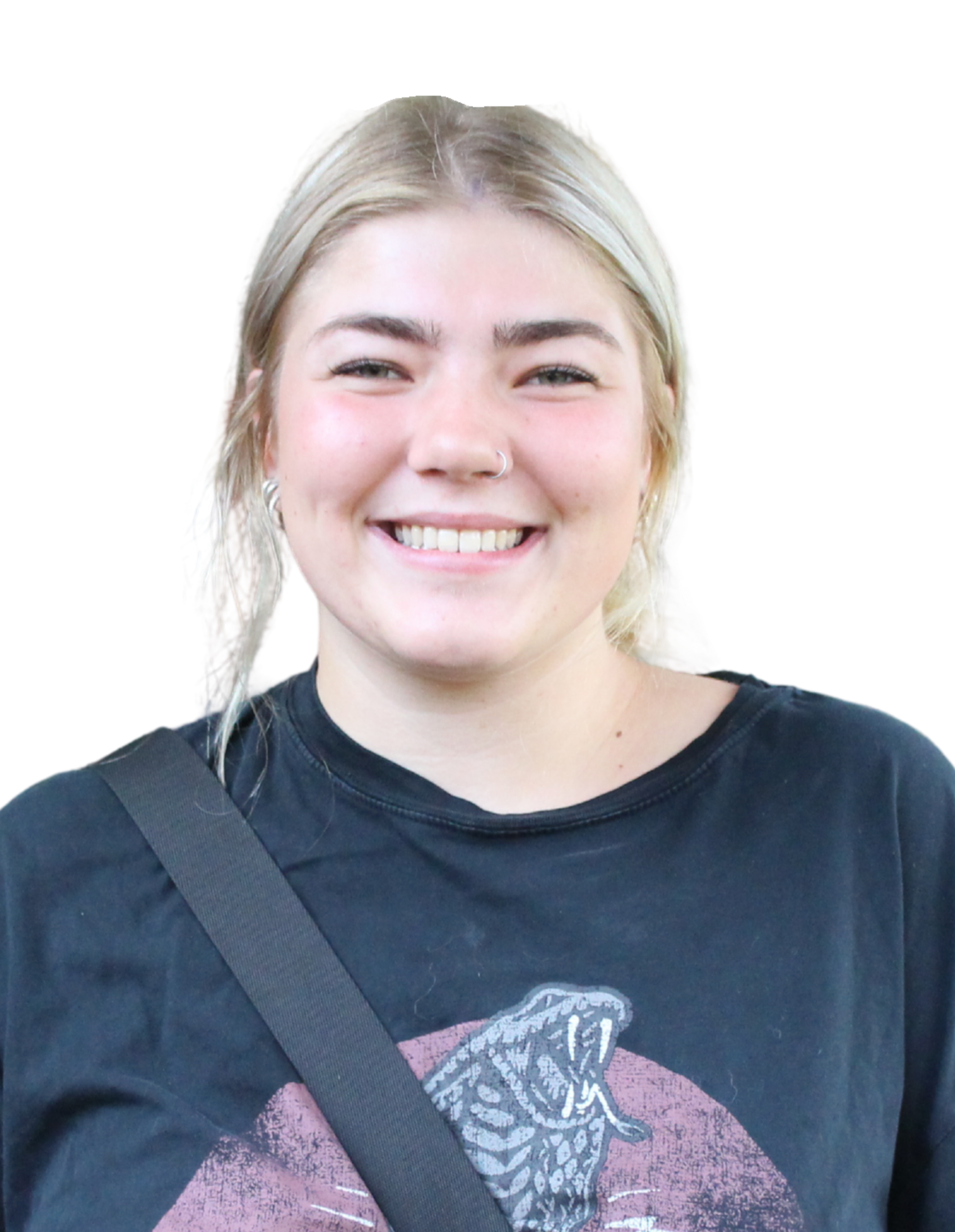 Faith smiling while wearing a black t-shirt.
