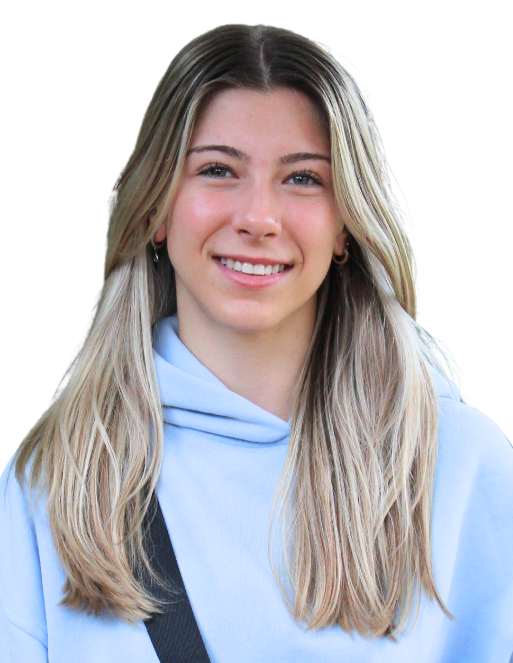Melissa smiling while wearing a light blue sweater.